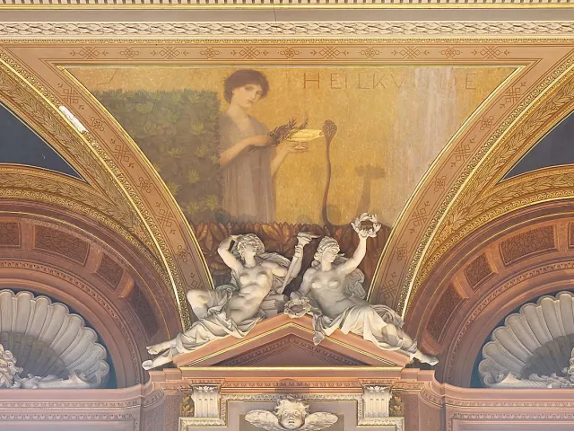 Zwickelbild „Heilkunde“, Detailansicht des Deckengemäldes im großen Festsaal im Hauptgebäude der Universität Wien